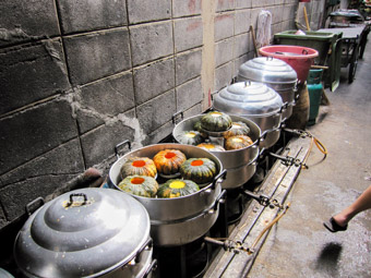 pots cooking in alley in Bangkok