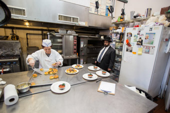 kosher kitchen with rabbi inspecting in queens new york
